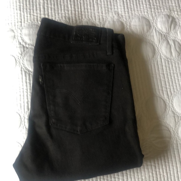 Levi’s black super skinny jeans. - Picture 2 of 9